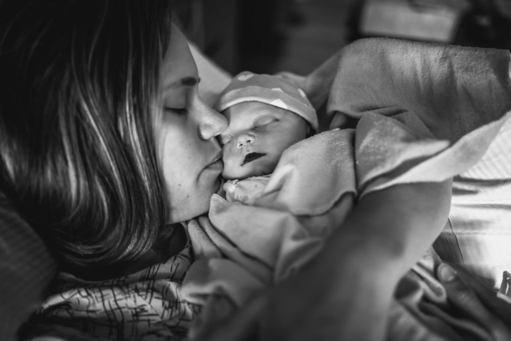 woman holding stillbirth baby